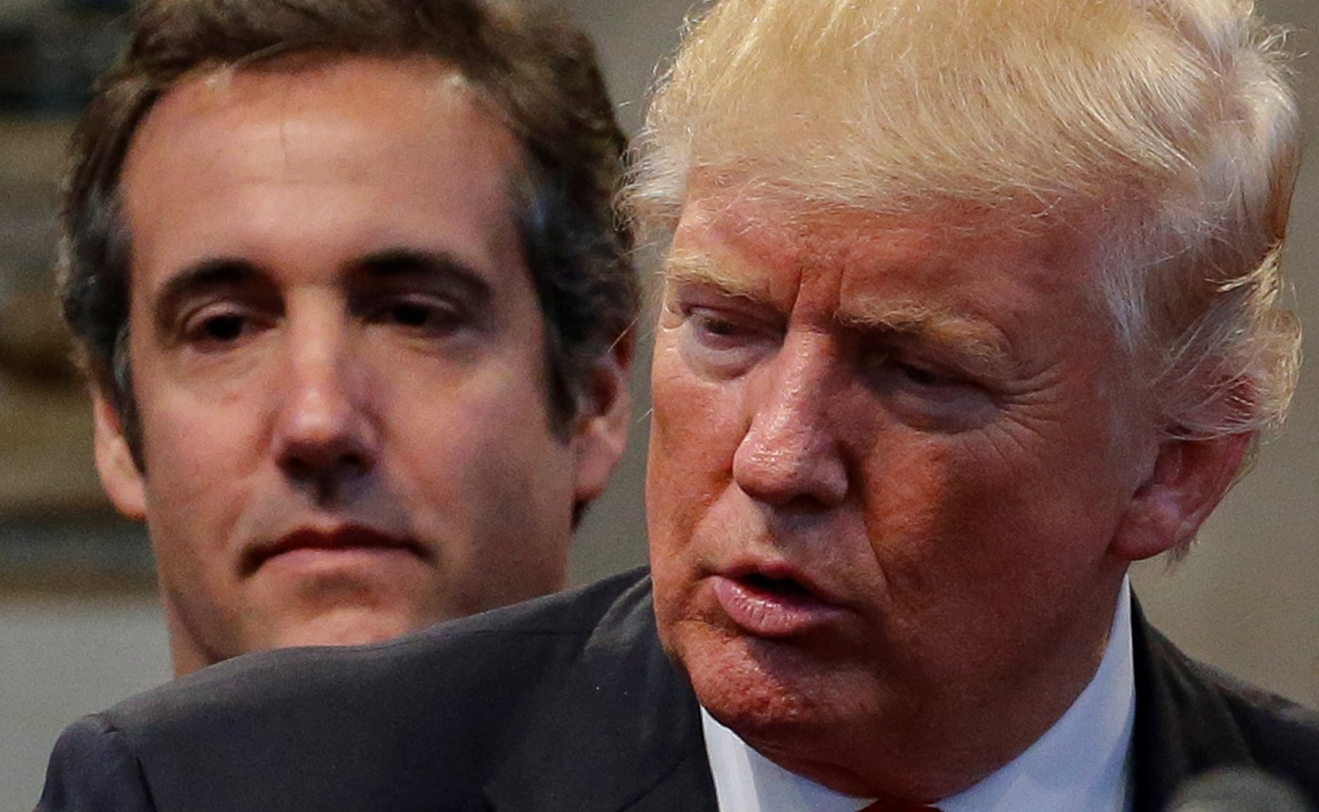 Republican presidential nominee Donald Trump's personal attorney Michael Cohen stands behind Trump as a group of supporters lay hands on Trump in prayer during a campaign stop at the New Spirit Revival Center church in Cleveland Heights, Ohio, U.S. September 21, 2016. Picture taken September 21, 2016. REUTERS/Jonathan Ernst - RC172532EC90