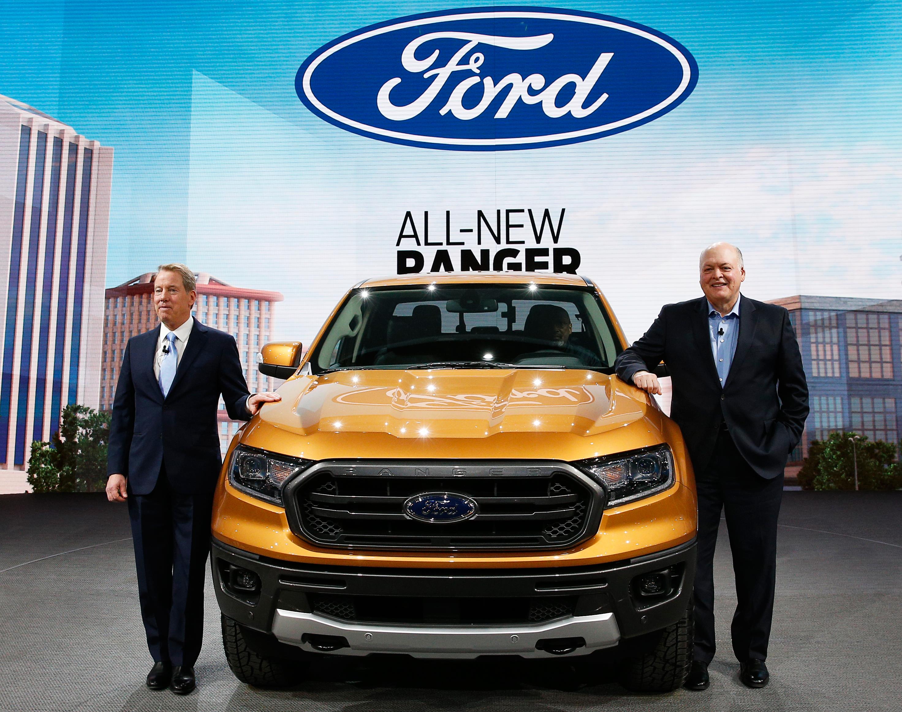 Bill Ford, executive chairman of the Ford Motor Company and Jim Hackett (R), President and CEO, present  the 2019 Ford Ranger during the Ford press preview at the North American International Auto Show in Detroit, Michigan, U.S., January 14, 2018. REUTERS/Rebecca Cook