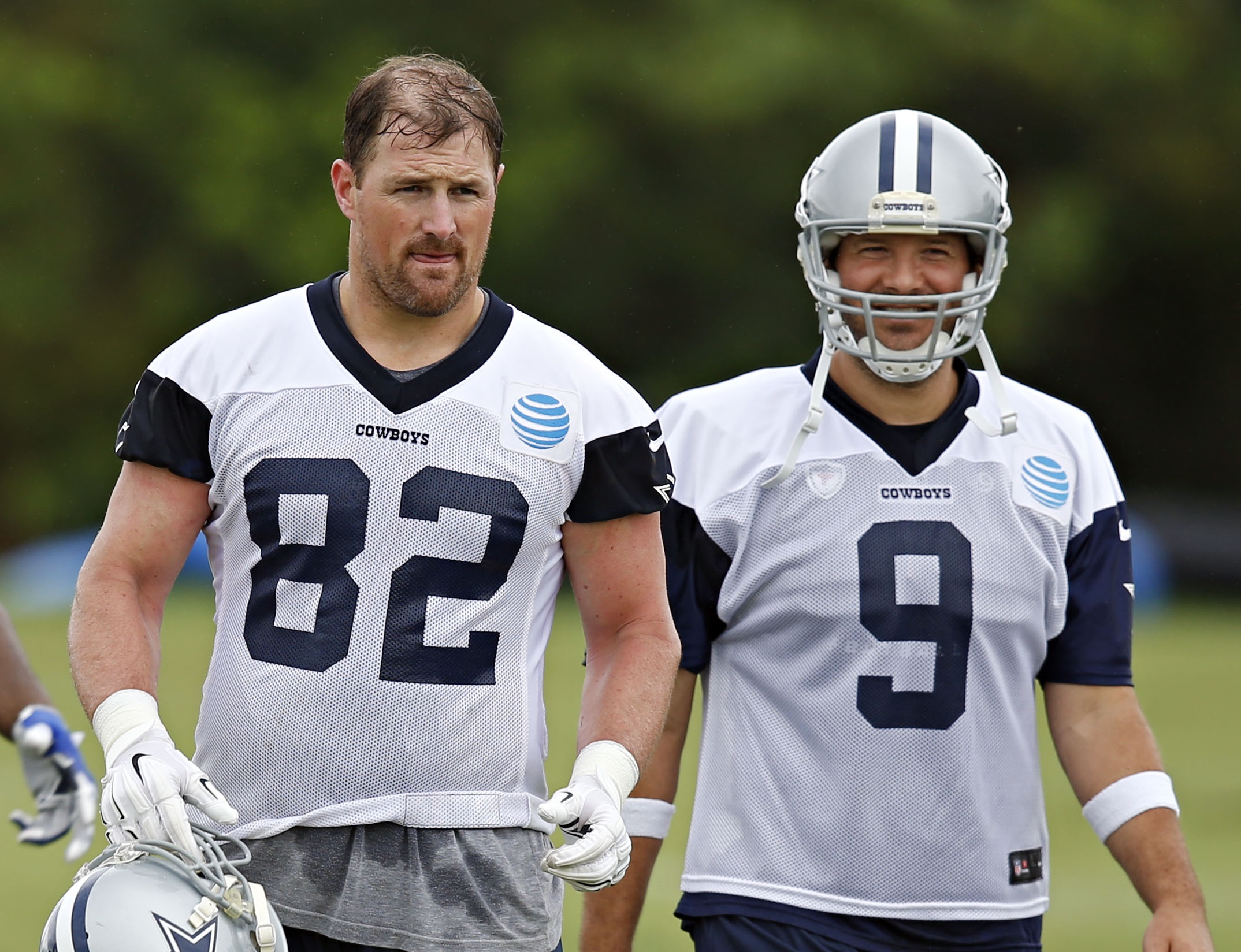 Dallas Cowboys tight end Jason Witten (82) and quarterback Tony Romo walk off the field during OTA's Wednesday, June 1, 2016 in Irving, Texas. (G.J. McCarthy/The Dallas Morning News)