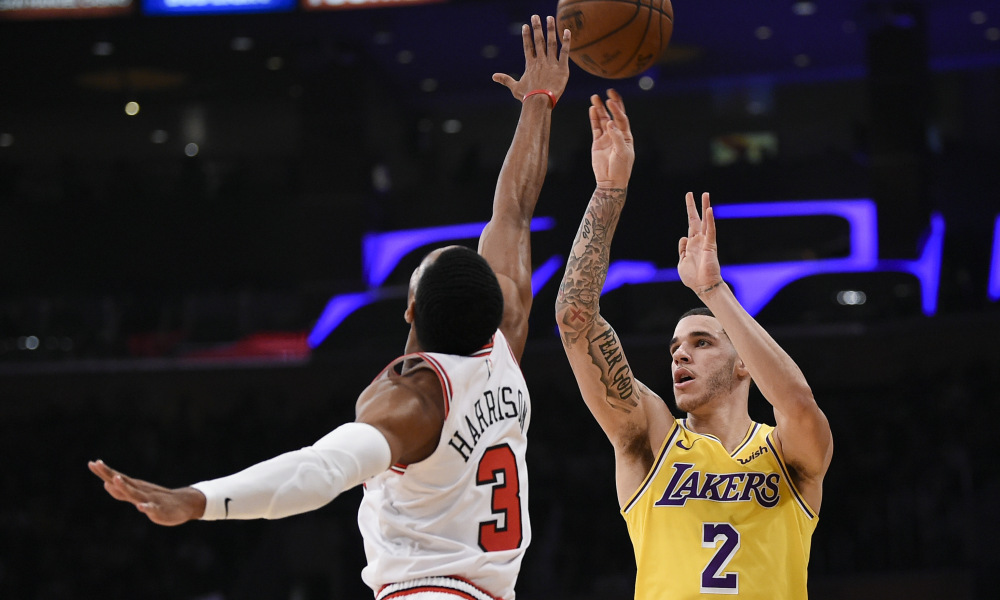 Jan 15, 2019; Los Angeles, CA, USA; Los Angeles Lakers guard Lonzo Ball (2) attempts a shot while Chicago Bulls guard Shaquille Harrison (3) defends during the second quarter at Staples Center. Mandatory Credit: Kelvin Kuo-USA TODAY Sports