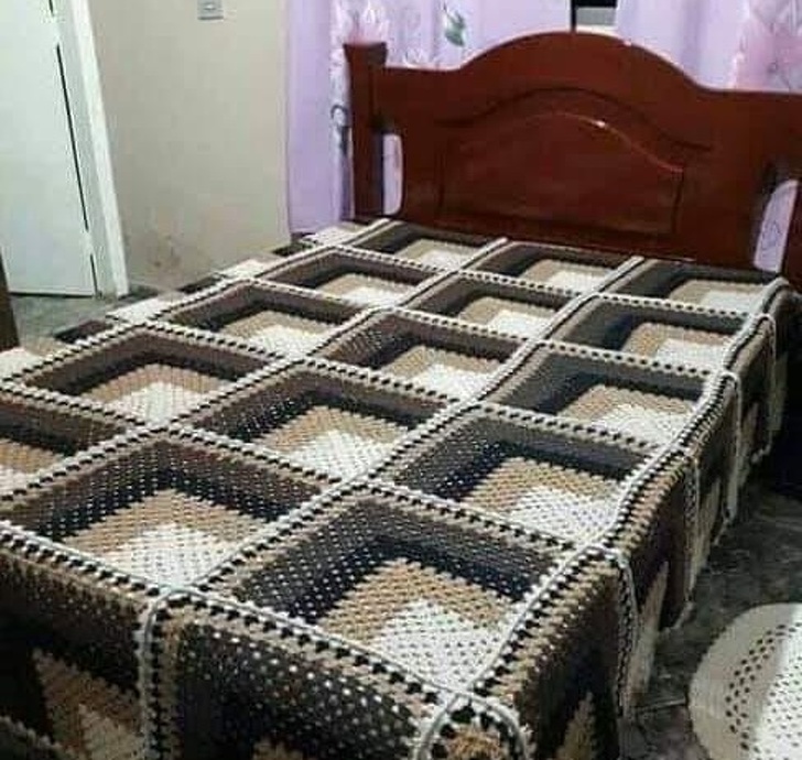 A bed with numerous sections or a checked bedsheet?