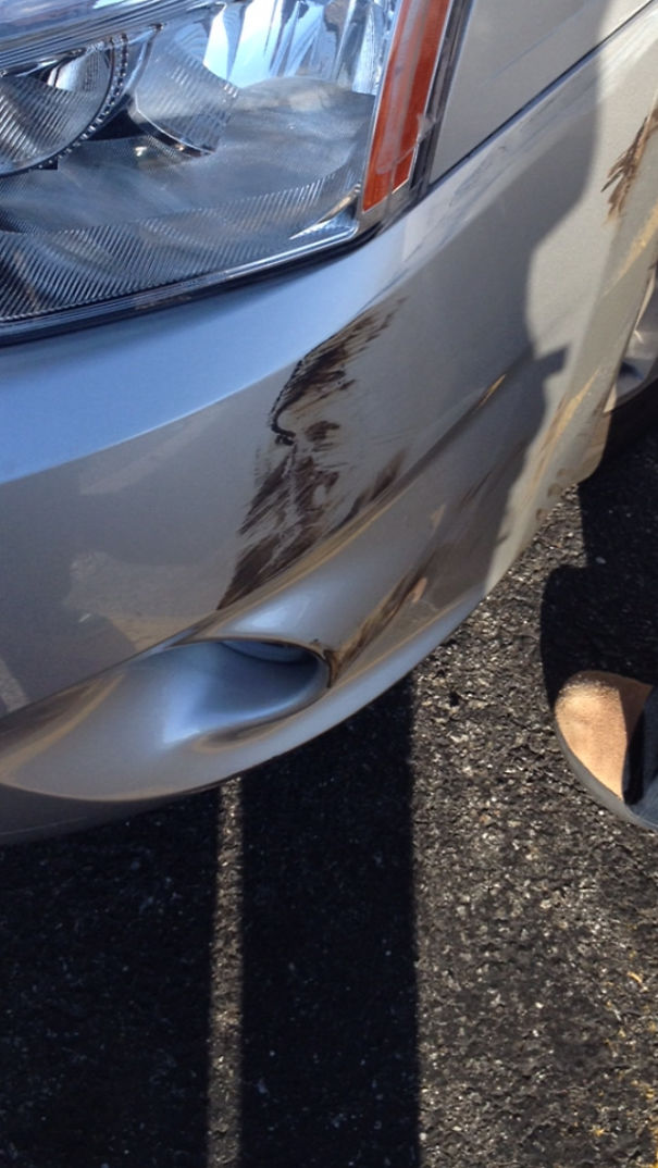A Face Was Scuffed Into My Car After A Minor Car Accident