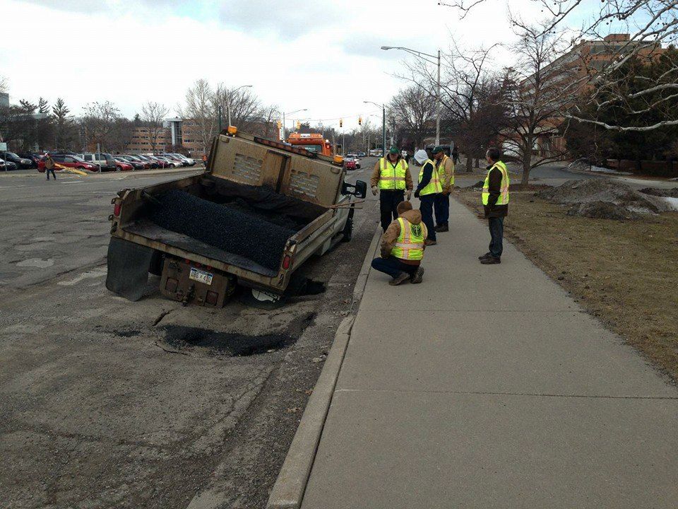 That awkward moment when a pothole takes out the repair truck