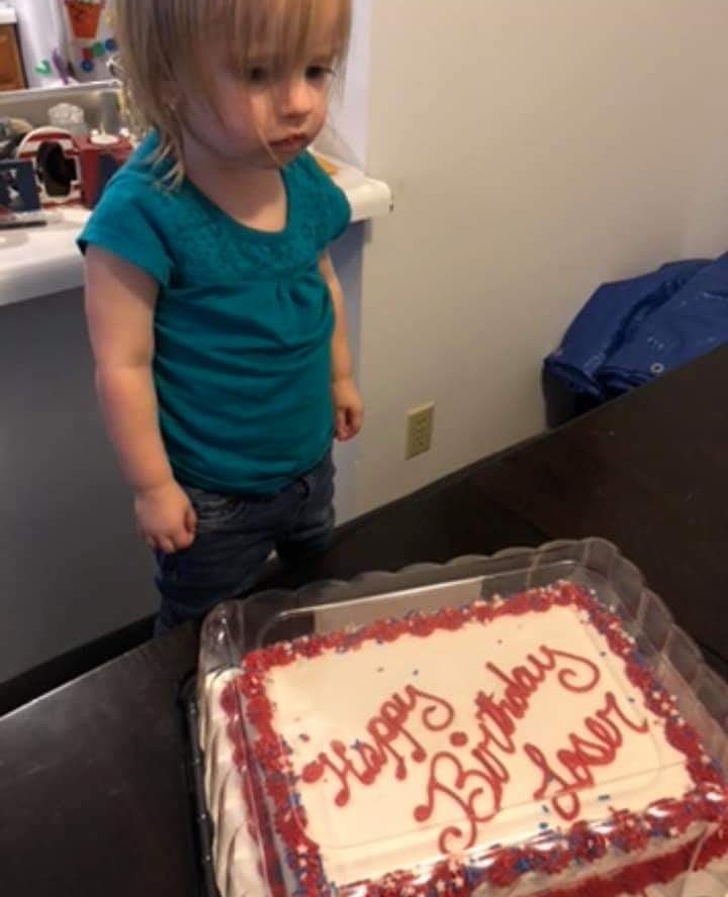 Her nickname is lizard! What's more awkward is written on the cake!