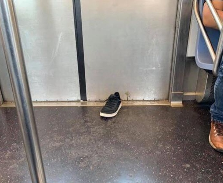 A guy lost his shoe the right place when the subway doors closed