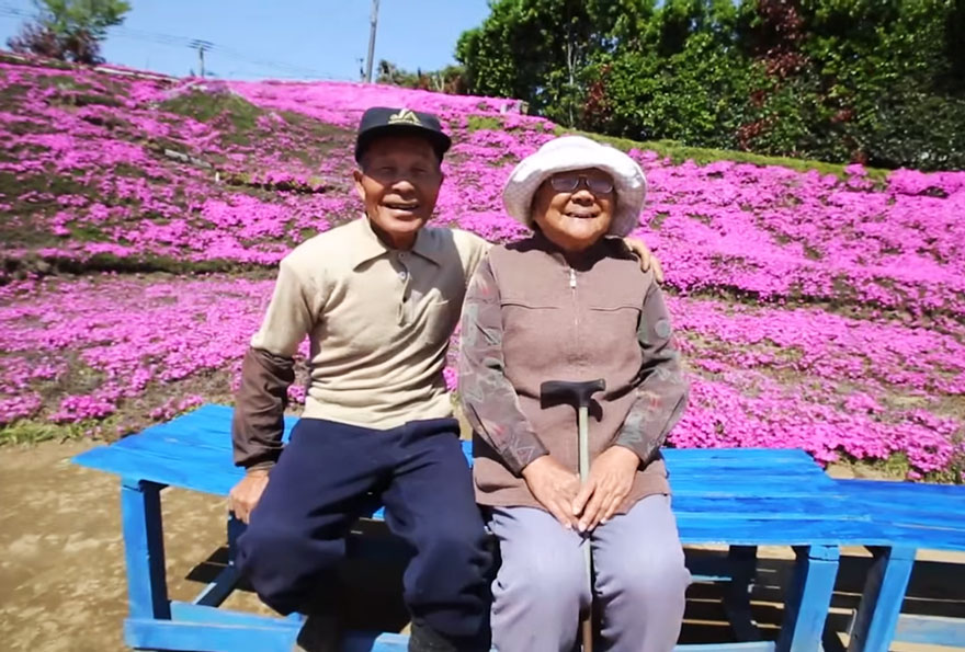 Mrs. Kuroki can't see anything but she loves to be around the flower garden