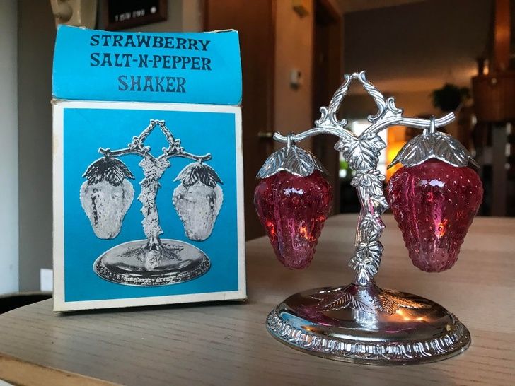 Cute vintage strawberry salt and pepper shakers were hidden in a pile of old junk.