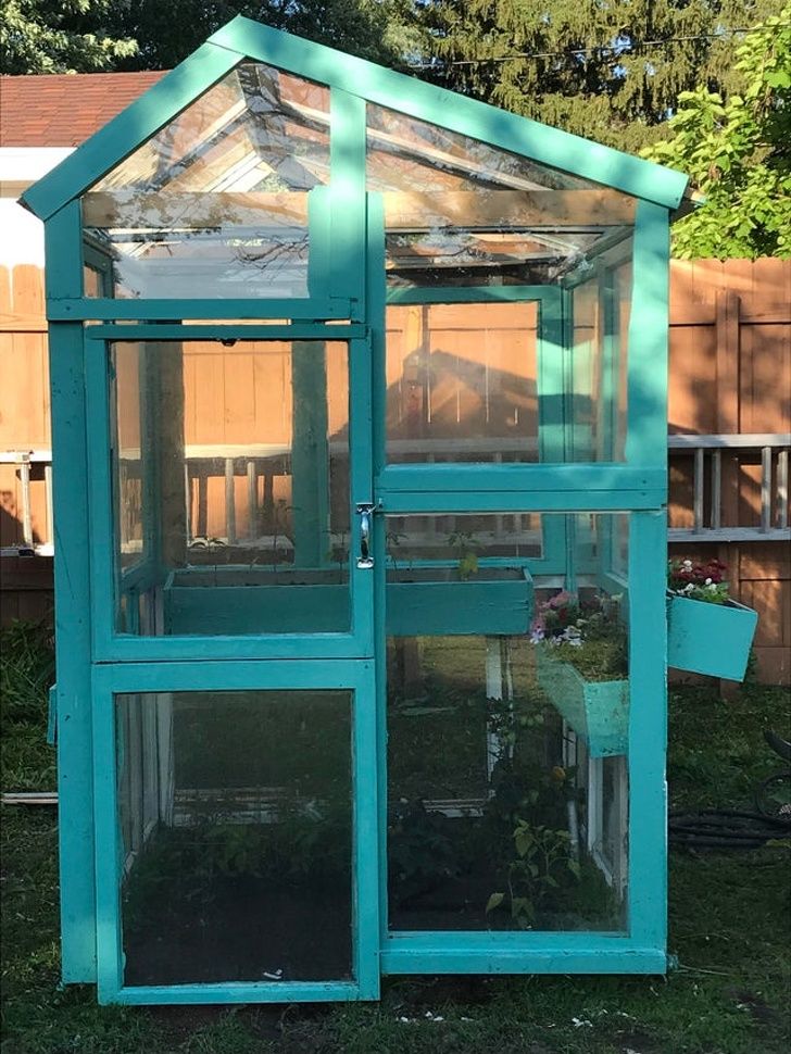 I upcycled old window to build my greenhouse.