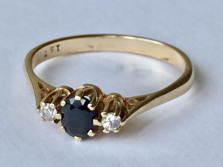 Cool things in Old Junk:"I found this diamond sapphire engagement ring in a rummage bowl for $2"