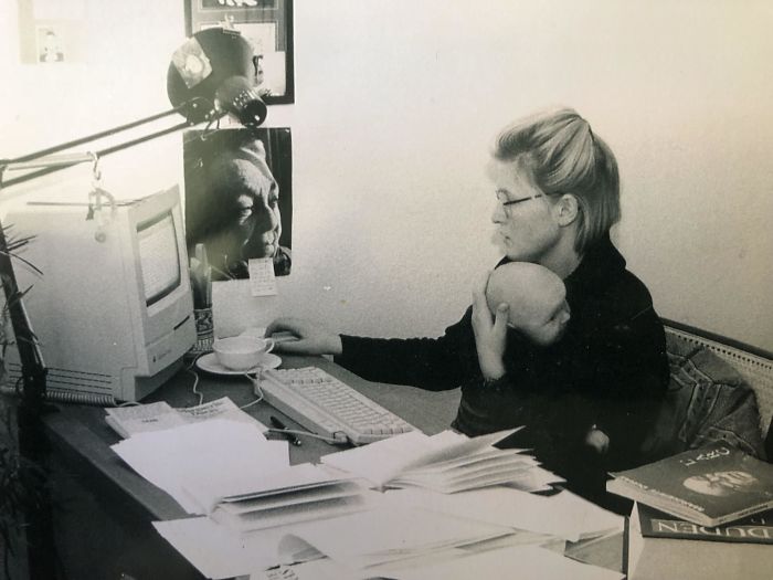 My parents are surely cooler than me: My mom holding me while writing her Master thesis