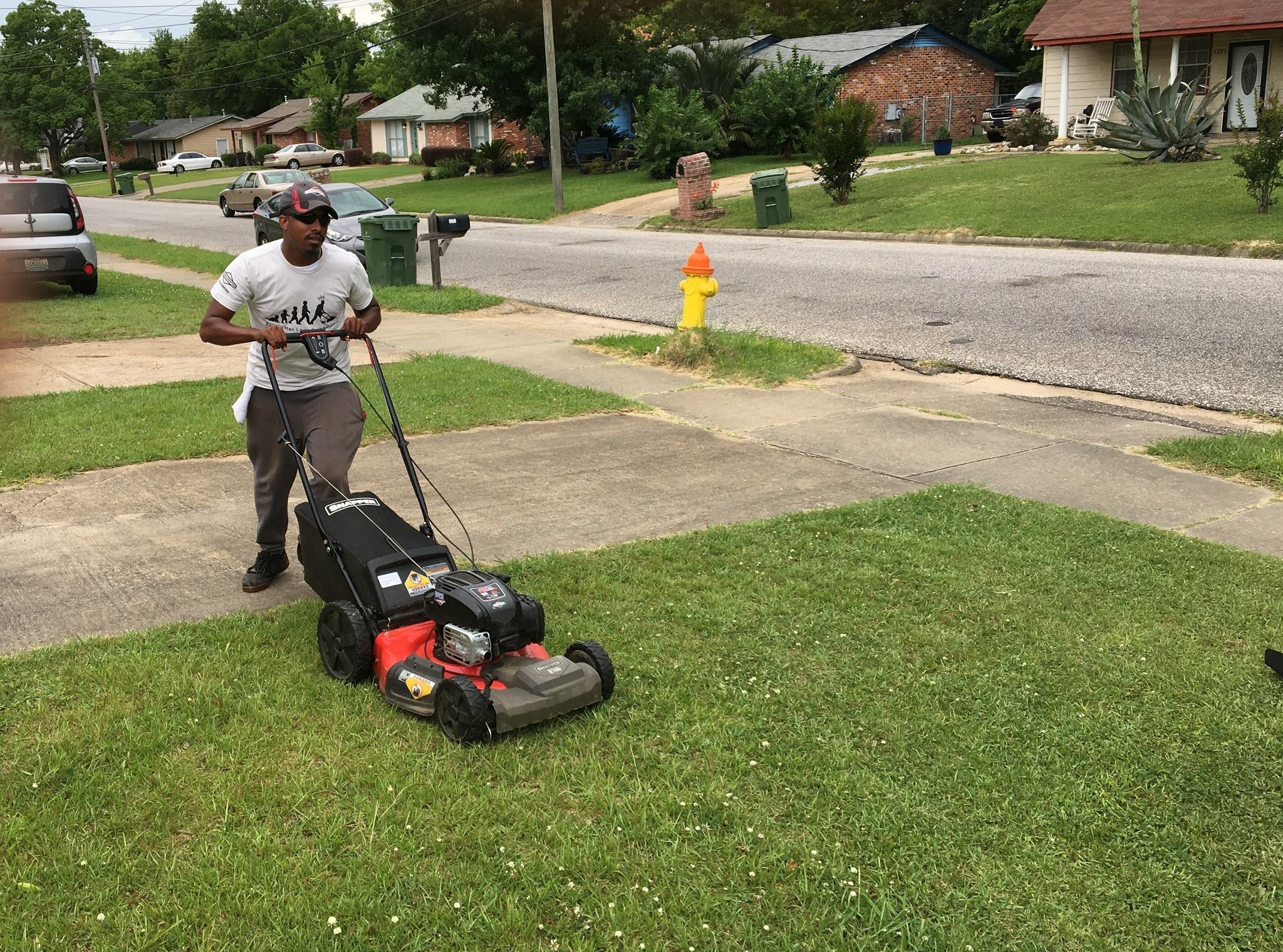 Rodney Smith mows the lawns