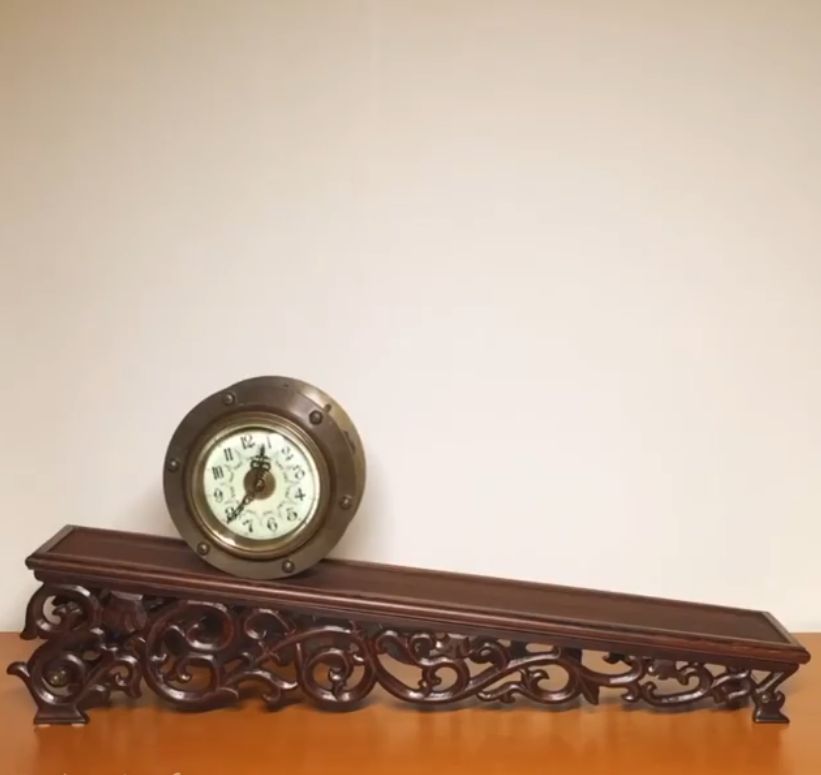 Strange Secrets: This is an incline gravity clock and the way it slowly descends down this ramp allows it to tell time despite having no batteries or mainspring