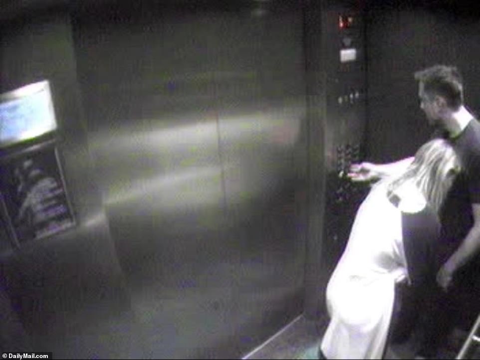 Amber Heard and Elon Musk in elevator