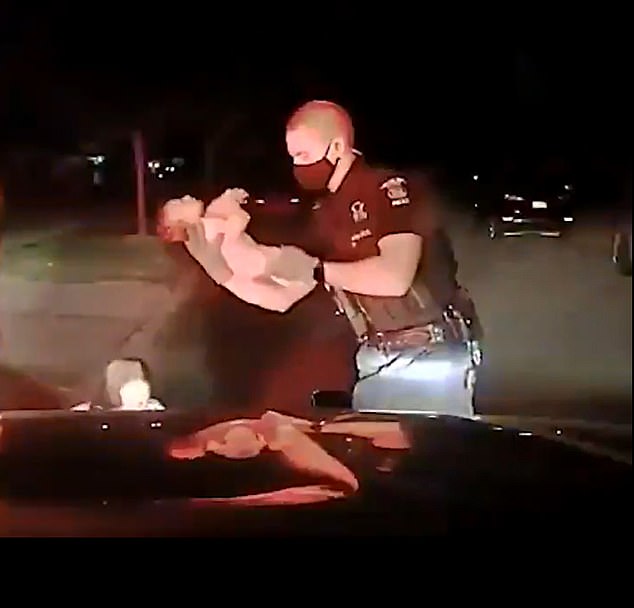 The Michigan Cop gets praised for his prompt action to save the newborn