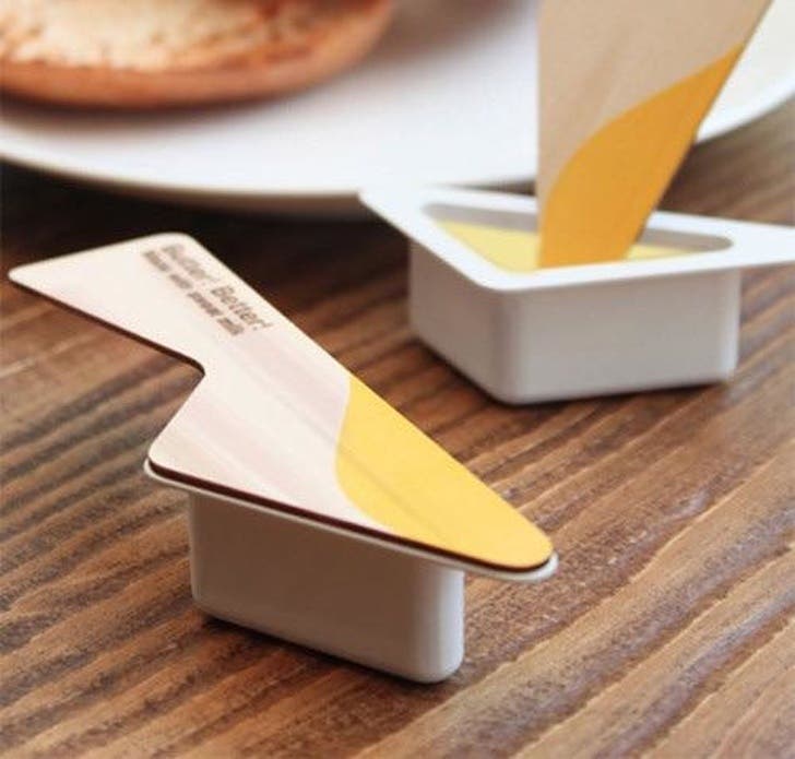 One of the best designs that show a tub of butter that even works as a knife