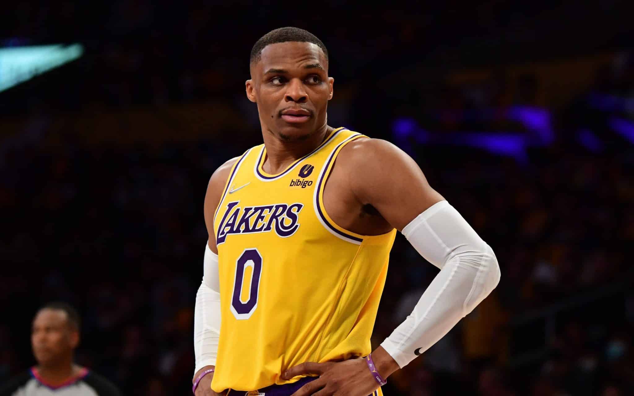 LOS ANGELES, CA - OCTOBER 19: Russell Westbrook #0 of the Los Angeles Lakers looks on during the game against the Golden State Warriors on October 19, 2021 at STAPLES Center in Los Angeles, California. NOTE TO USER: User expressly acknowledges and agrees that, by downloading and/or using this Photograph, user is consenting to the terms and conditions of the Getty Images License Agreement. Mandatory Copyright Notice: Copyright 2021 NBAE (Photo by Adam Pantozzi/NBAE via Getty Images)