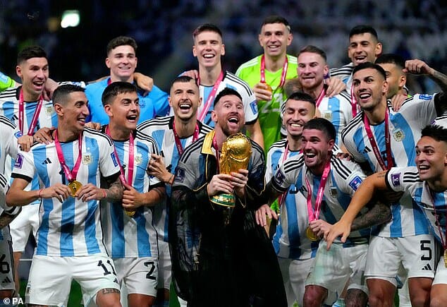 Lionel Messi celebrating FIFA World Cup victory with his team