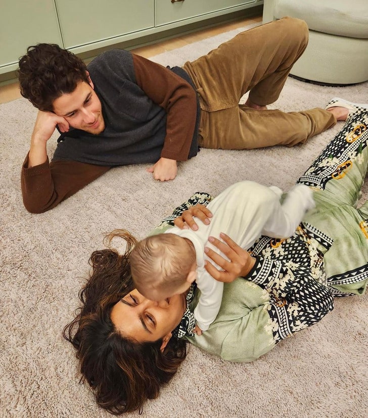 Nick Jonas and Priyanka Chopra with their daughter Malti