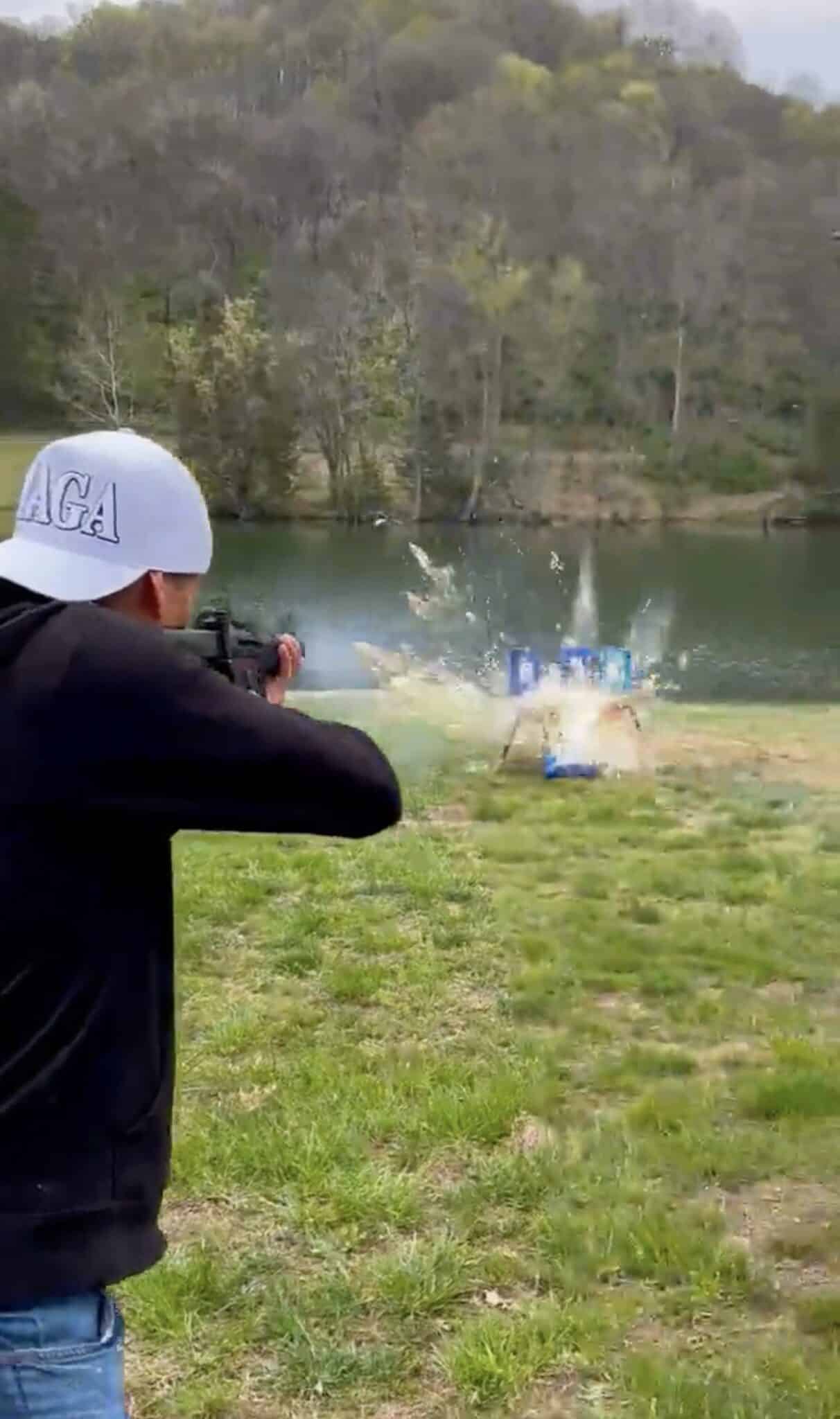 Kid Rock shooting Bud Light cans