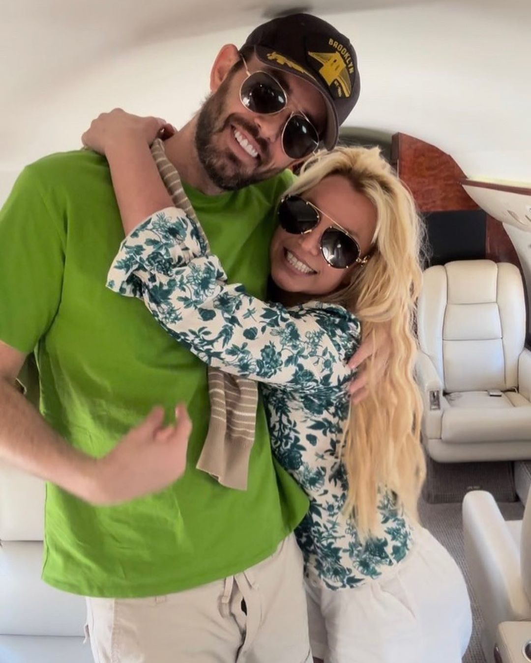 Britney Spears ditched her wedding ring while vacationing with pal Cade Hudson (pictured here) and not husband Sam Asghari.
