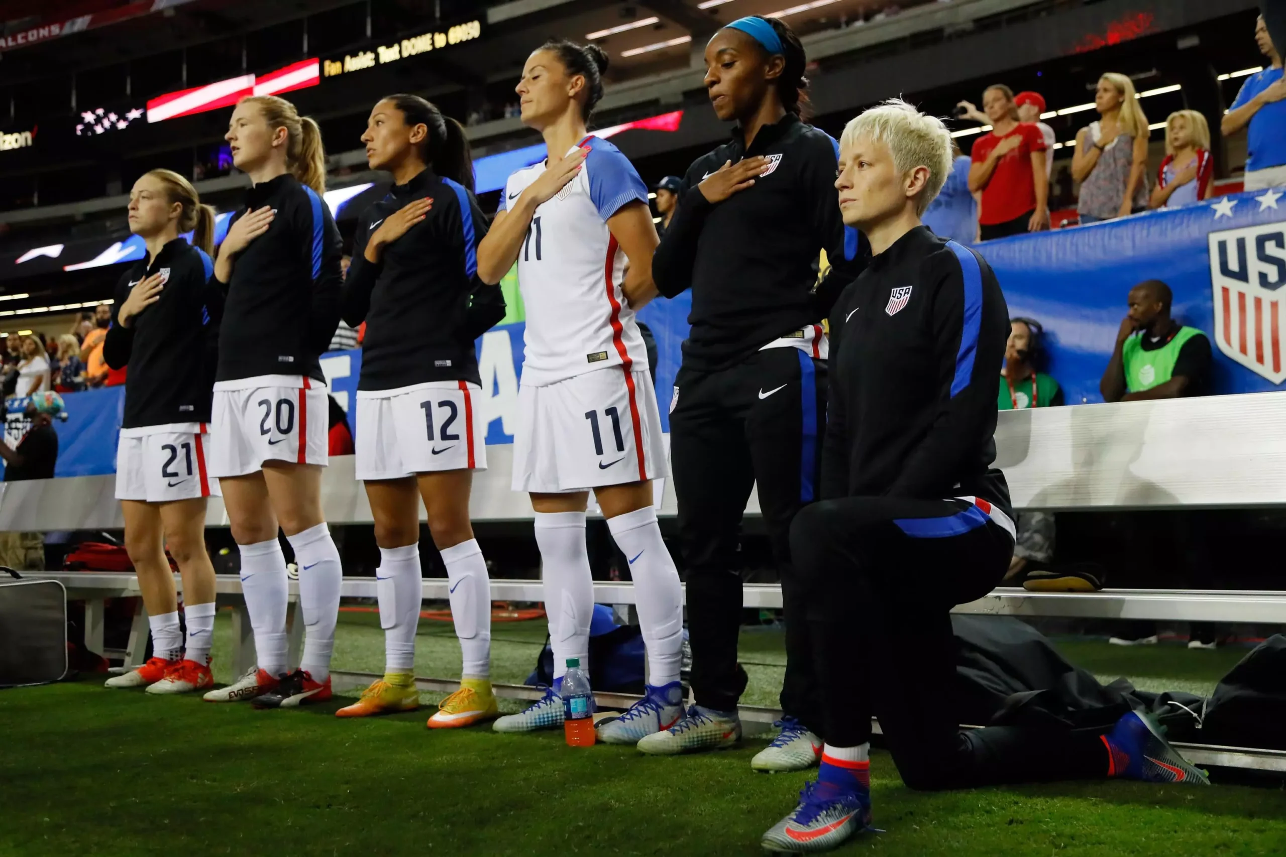 Megan Rapinoe, kneeling