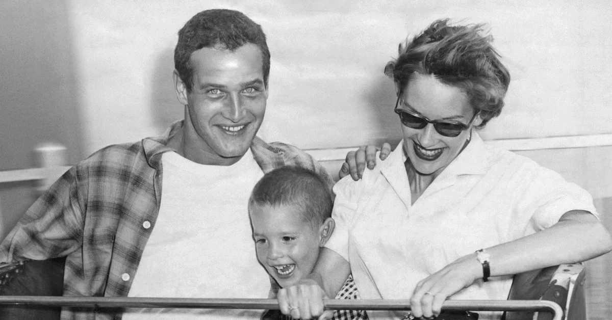 Paul Newman with Jackie and their child