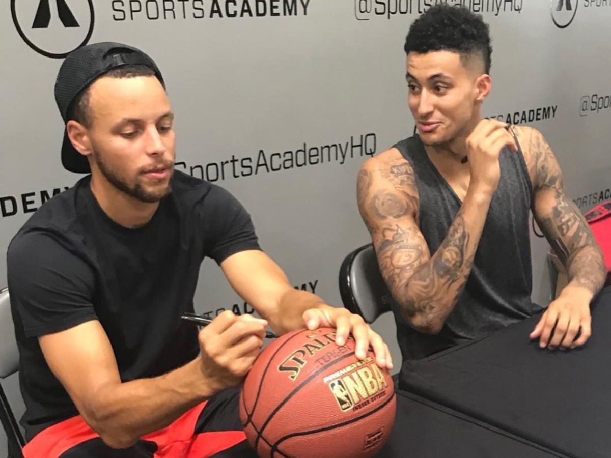 Kyle Kuzma and Stephen Curry