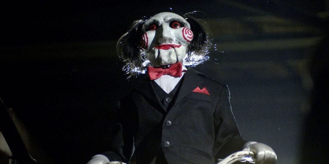 Jigsaw's Creepy Companion Billy Hilariously Roasts Fans' 'Saw' Reviews! Discover the Horror and Humor of 'Saw X'!