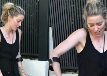 Amber Heard Braves Madrid Playground with Daughter, Leaning on Crutches after Marathon Training Mishap