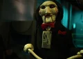 Jigsaw's Creepy Companion Billy Hilariously Roasts Fans' 'Saw' Reviews! Discover the Horror and Humor of 'Saw X'!