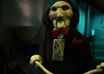 Jigsaw's Creepy Companion Billy Hilariously Roasts Fans' 'Saw' Reviews! Discover the Horror and Humor of 'Saw X'!