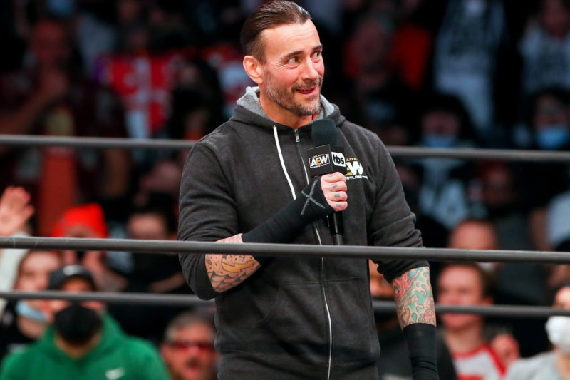 Is CM Punk Eyeing a WWE Comeback? The Inside Scoop on Reigns and Rollins' Stance