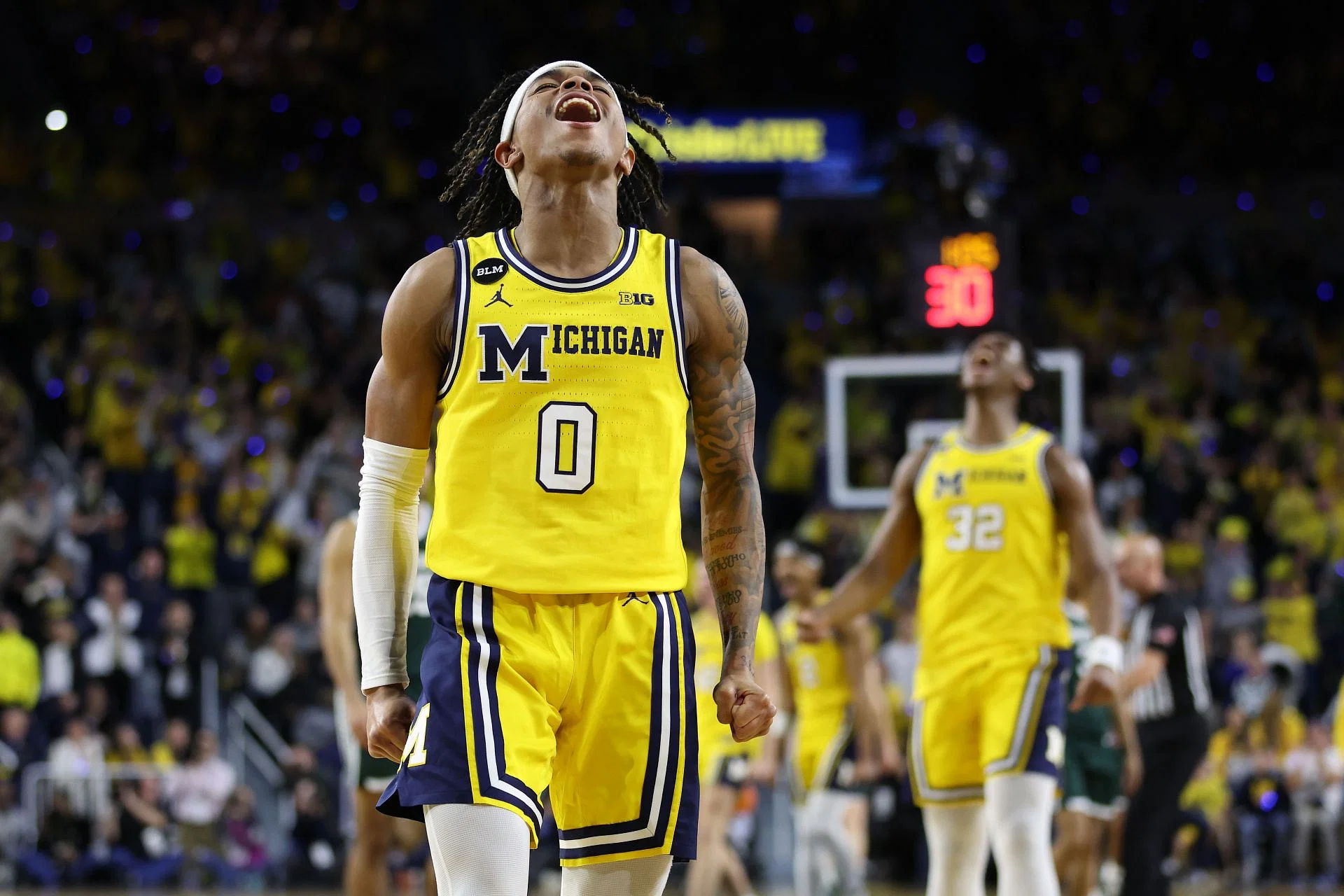 Michigan Hoops in Turmoil: Dug McDaniel's Road Game Ban Shakes Team's Core, Challenges Coach Howard