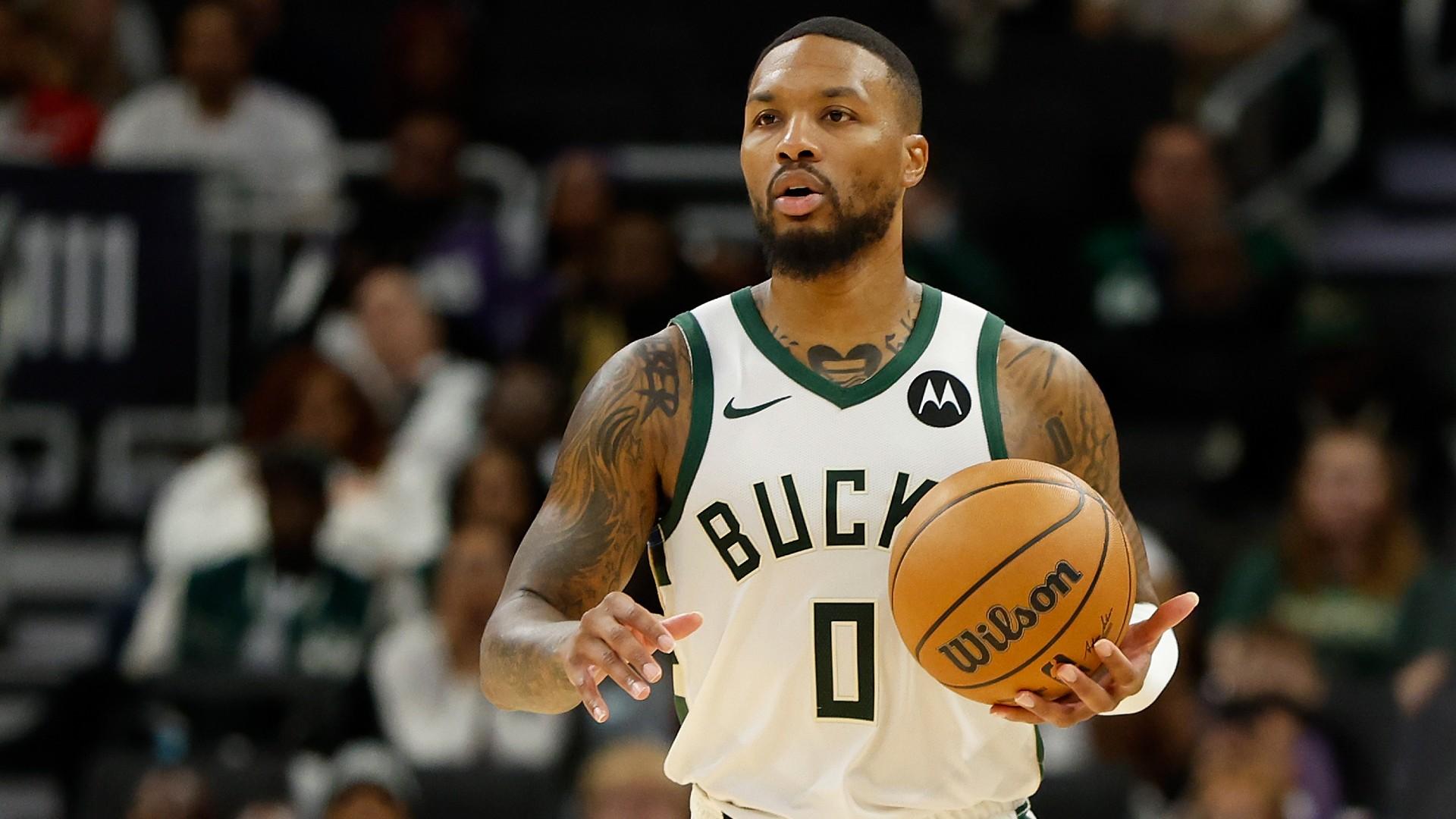 Milwaukee Bucks' Damian Lillard Hits Last-Second Three-Pointer, Giannis Celebrates Victory in Epic Overtime Thriller----