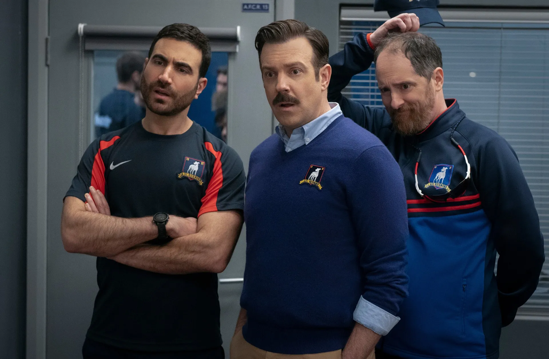 Jason Sudeikis as Ted Lasso, the beloved American football coach in England.