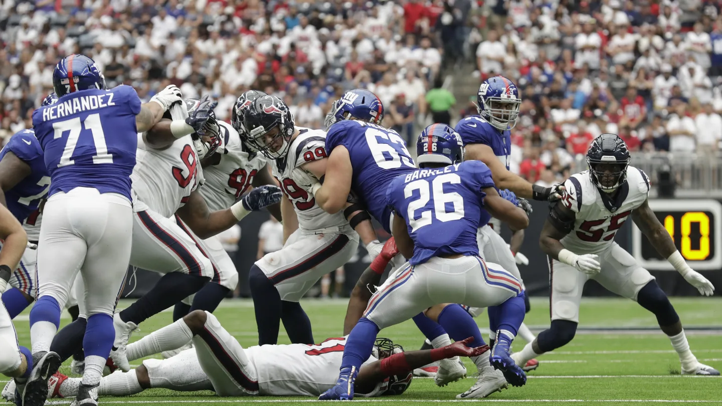 NFL Buzz: Is Star Running Back Saquon Barkley Hinting at a Major Move to the Texans?