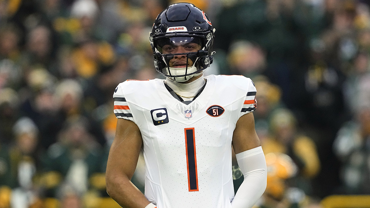 Justin Fields donning his new Pittsburgh Steelers jersey, marking a new chapter in his career.