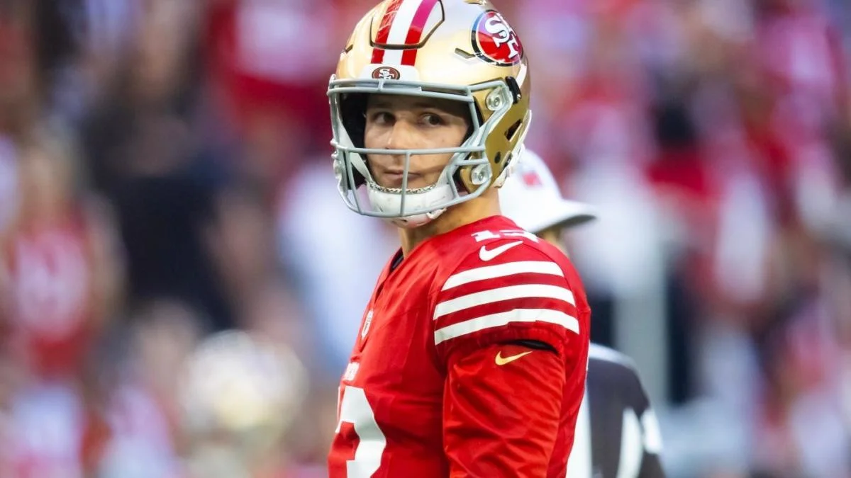 Brock Purdy's Journey from 'Mr. Irrelevant' to 49ers' Key Player and the Financial Puzzle Ahead