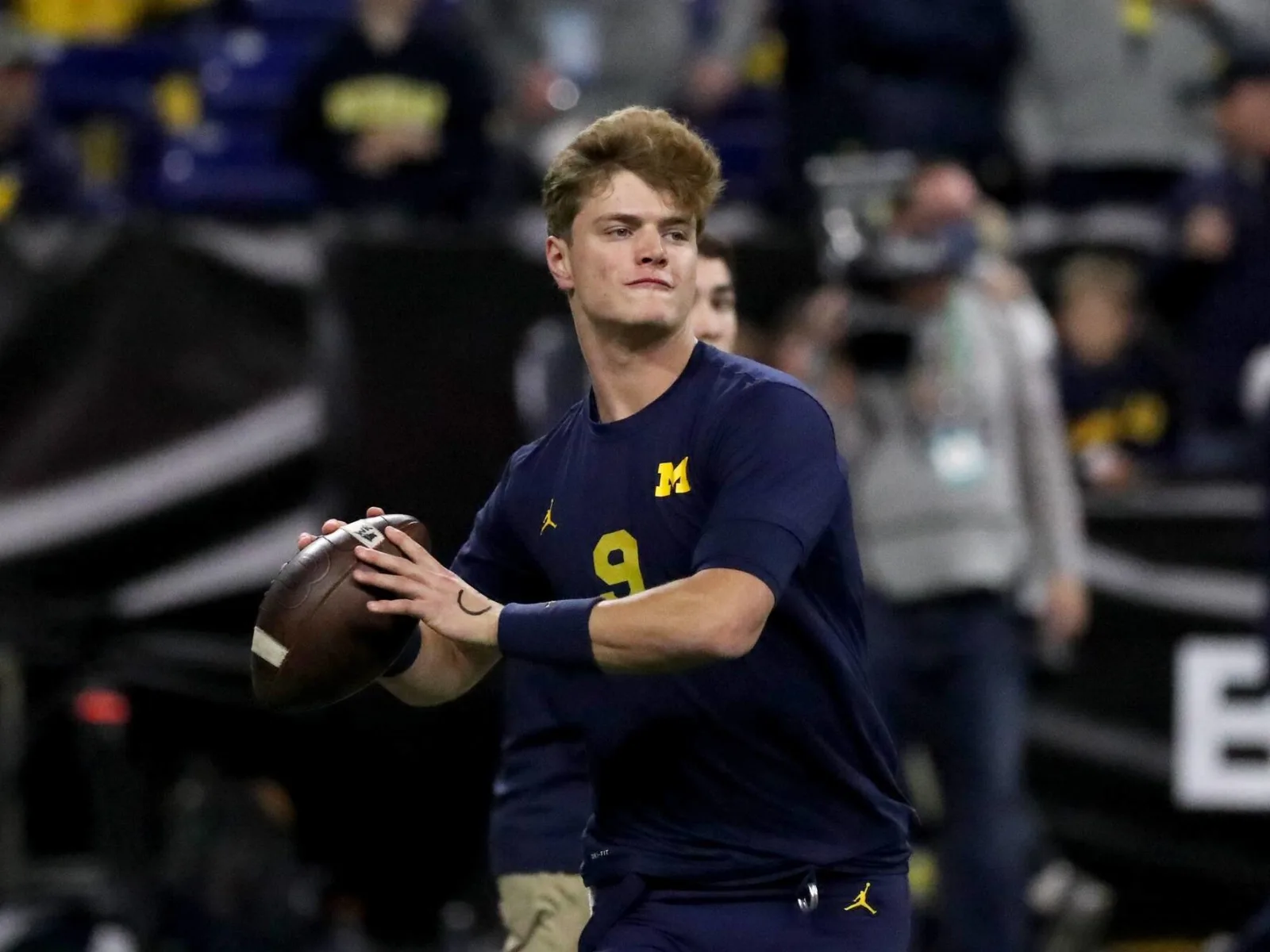 Rising Star Michigan Wolverines Coach Defends J.J. McCarthy Amidst Draft Debate.